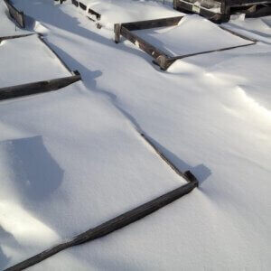 new england slate snowy roof