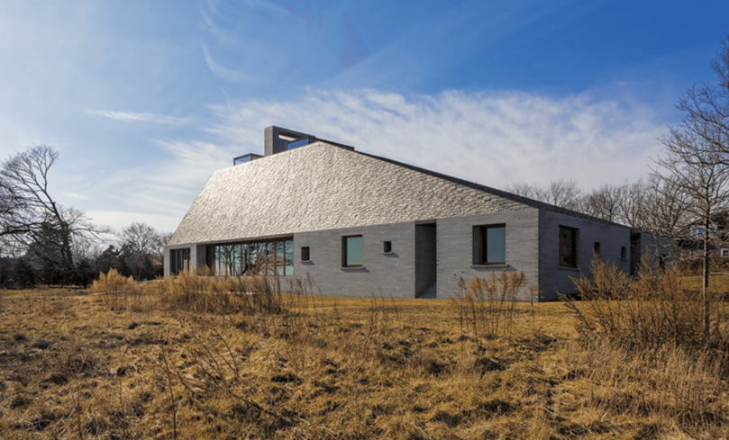 new england slate in architectural record building with greenery